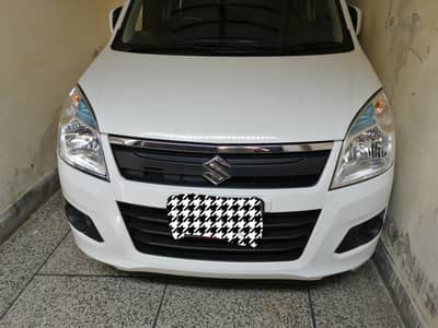 suzuki wagon r low milage. showroom condition