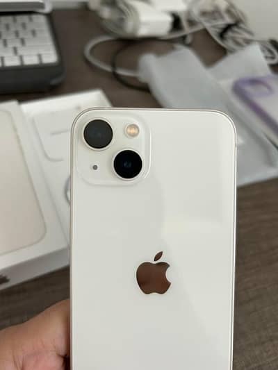 Apple iPhone 13, with 8 phone covers