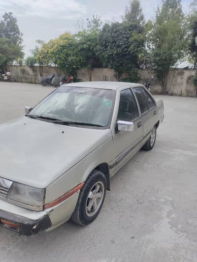 Mitsubishi lancer 86 model contact no 03003858348