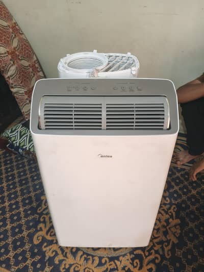 Midea 1.2 ton Ac - 10/10  selling because shifting office