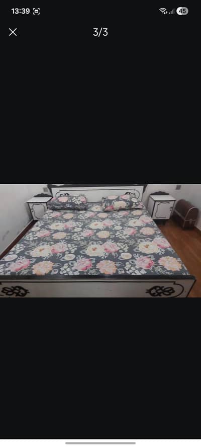 bed with two sides tables