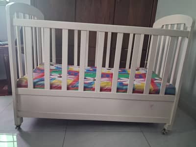 Wooden baby cot