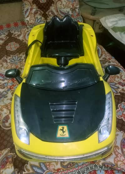 Kids Ferrari rechargeable Car battery operated ( working condition )