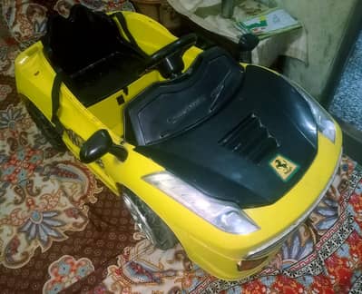 Kids Ferrari rechargeable Car battery operated ( working condition )
