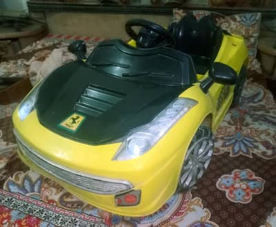 Kids Ferrari rechargeable Car battery operated ( working condition )