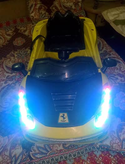 Kids Ferrari rechargeable Car battery operated ( working condition )