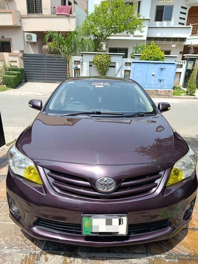 Toyota Corolla GLI 2012     what's app num 03338122330