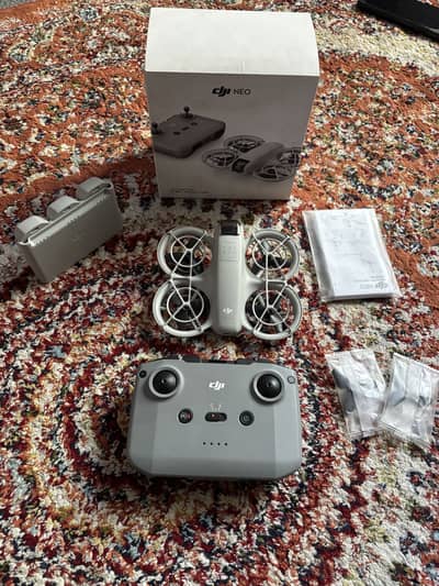 Dji neo flymore combo 4k almost new drone