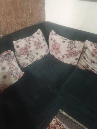 L shaped greenish black sofa set