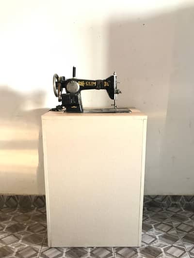 clothes stitching cabinet with chair and drawers