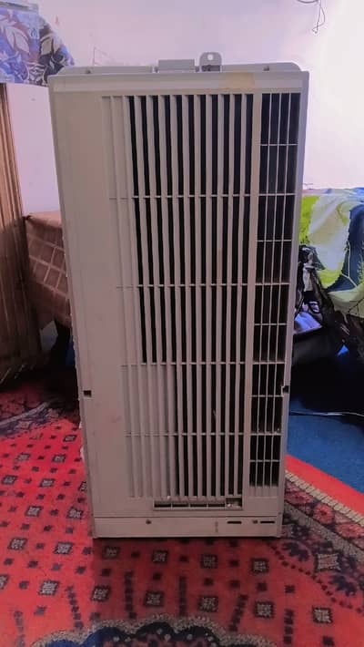 This is a Corona portable window air conditioner.