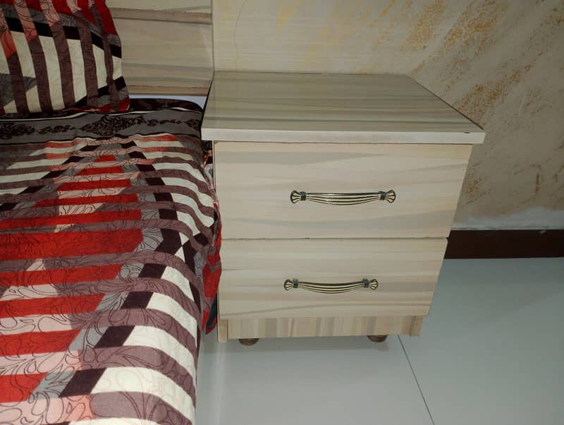 2 bed single single with side table 3