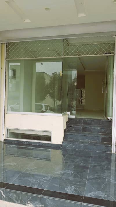 Near KFC Ground Floor Commercial Shop Available For Rent In Sector C, Bahria Town Lahore.