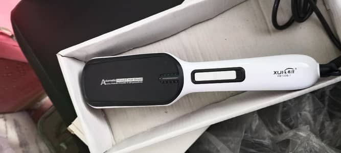 Hair straightener brush