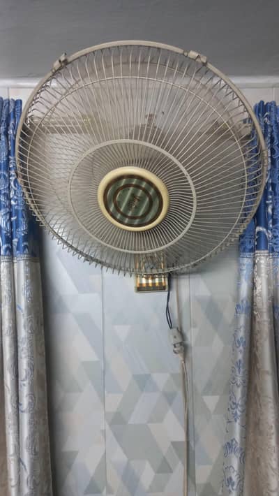 vintage wall fan and good works