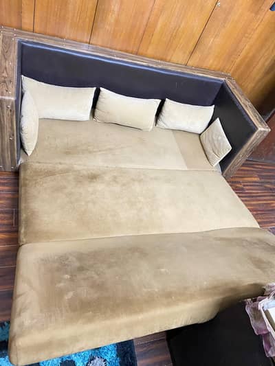 Sofa cum double bed with cushions