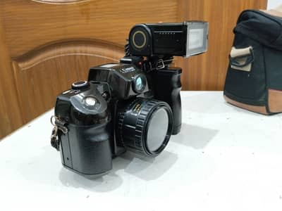 Vintage Canon Film Camera Made in Japan with Flash & Grip
