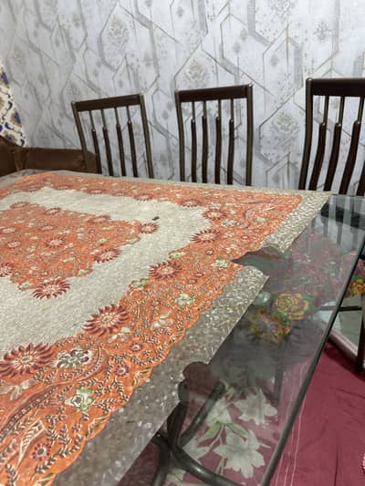 Urgent For sale: home use dining table with 6 flexible chairs