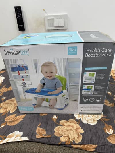 Happicute Booster/high chair - Brand new