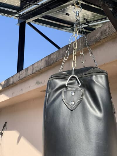 Boxing bag with gloves for sale