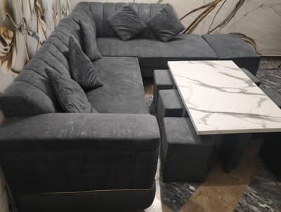 L shaped sofa with center table and 6 Saties for sale