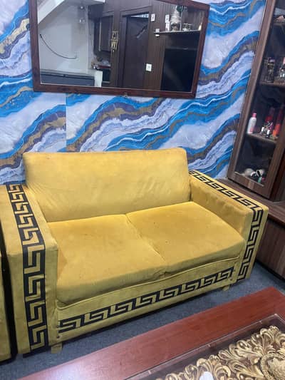 golden Versace style sofa