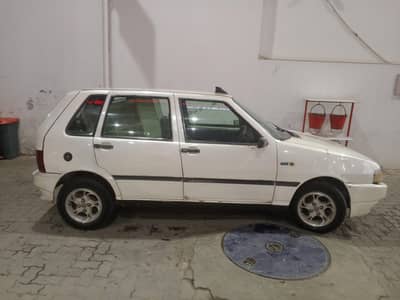 Fiat Uno 2004 beter than cultus wagnor alto Toyota