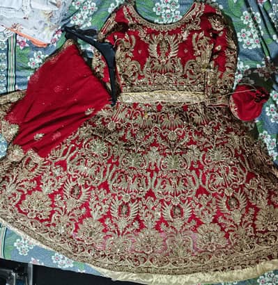 Gorgeous Embroidered Red Bridal Lehenga with matching jewelry set