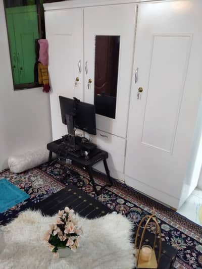 Bed and wordrobe