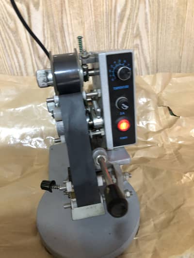 Manual printing coding machine