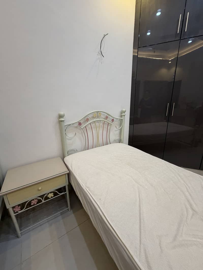 Single bed with side table 2