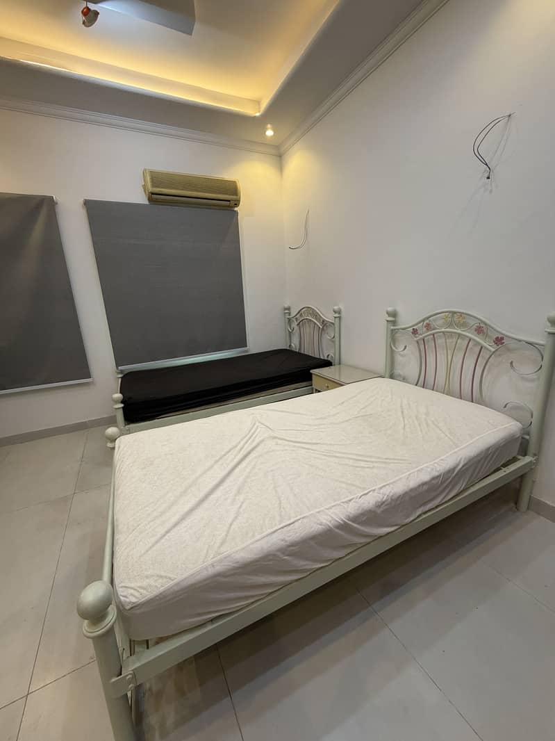 Single bed with side table 6