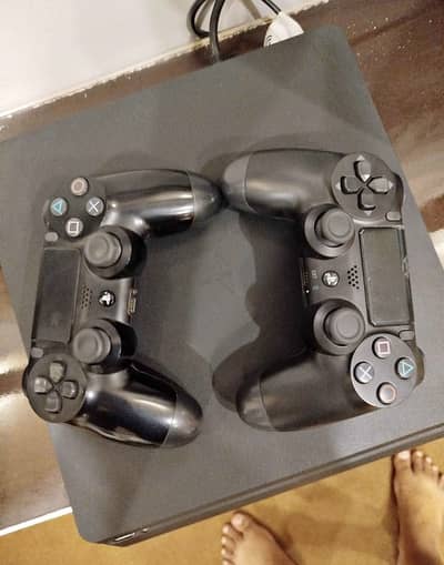 PS4 slim 3tb full of games with two controllers