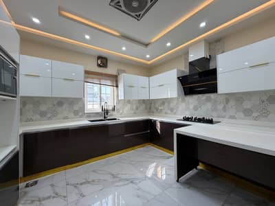 1 Kanal luxury designer house with 15kv solar installed 5 bed accommodation 2 American kitchen 1 Servent two species TV lounge available for rent in Bahria Enclave Prime Location near to market park masjid.