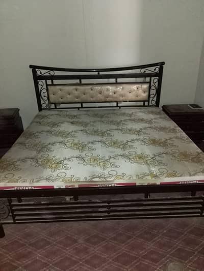 bed with side table