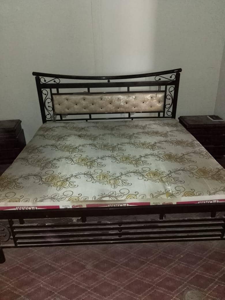 bed with side table 0