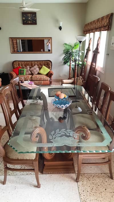 Glass top dinning table with chairs