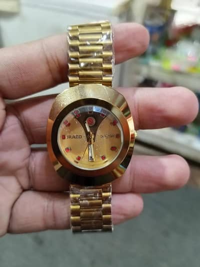 Rado Diastar Original Gold Watch with shiel Design