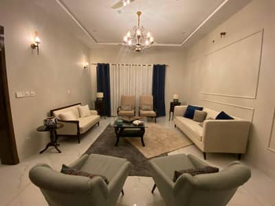 Modern Design 10 Marla House For Sale in DHA Phase 5 at a Prime Location