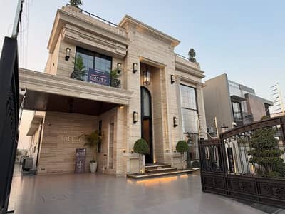 One Kanal Brand New Classic Design Most Beautiful Full Basement Fully Furnished Home Theater Swimming Pool GYM LIFT Bungalow For Sale At Prime Location Of DHA Lahore Near To Park Masjid &Amp; Commercial Market.