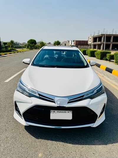 Toyota Corolla Grande 1.8X 23/24 Total Genuine White Color For Sale