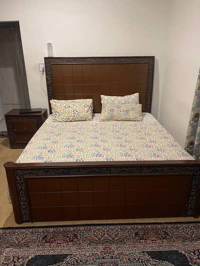 king size bed with mattress, and 2 side tables