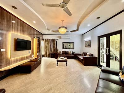 One Kanal Slightly Used Ultra-Modern Designer Facing Park Bungalow For Sale At Prime Location Of DHA Lahore Near To Park Masjid & Commercial Market