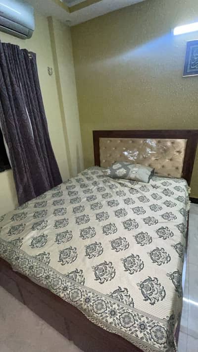 Wooden double bed