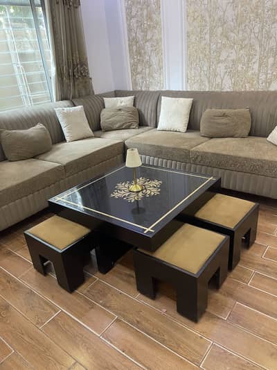 Coffee table with four stools