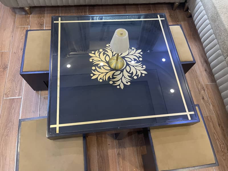 Coffee table with four stools 2