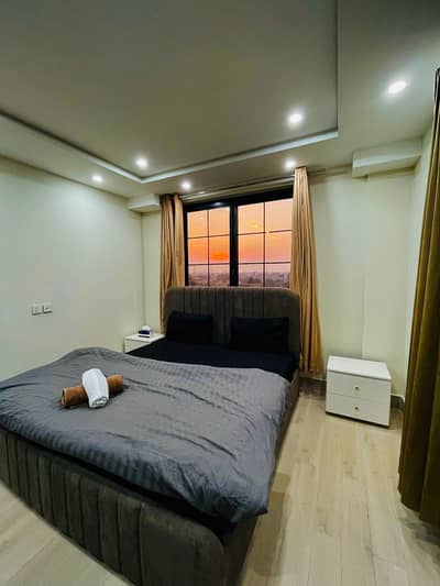 DAILY BASIS APARTMENT AVAILABLE FOR RENT IN TULIP BLOCK BAHRIA TOWN LAHORE