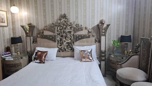 Bed with Chair and Side Tables