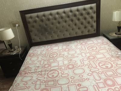 pure wooden bed with side tabels