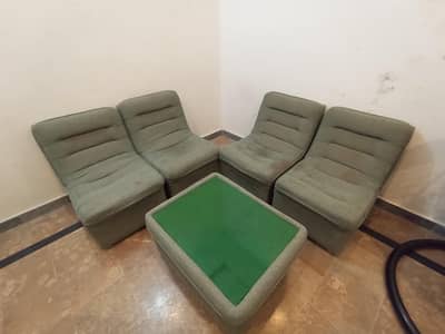 4 Green single seater sofa+ Glass Centre Table used + good condition